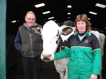 John Shropshire with his sister Melanie and their cow Floss