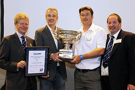 RABDF president, Prof David Leaver presents the award to Chris and Graham Shepherd with RABDF council member, Angus Wielkopolski